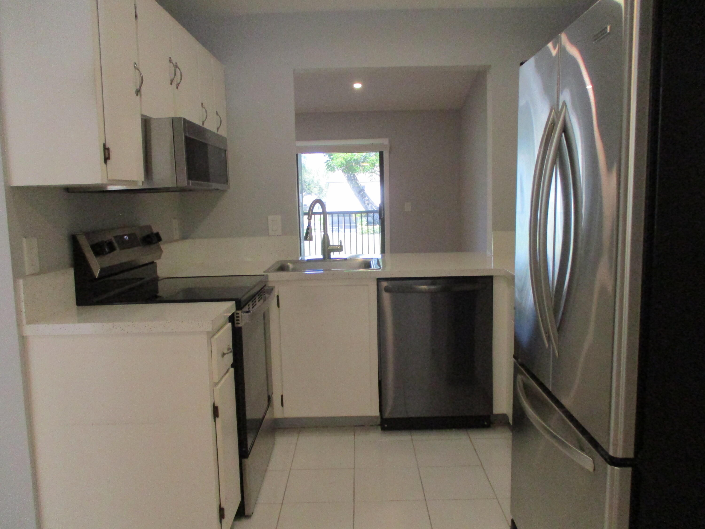 23398 Southwest 57th Avenue, Unit 306 Boca Raton, FL 33428 - Photo 6 of 31 IMG_3812