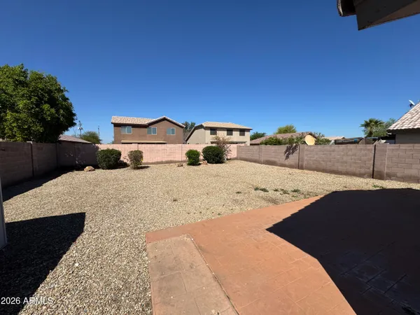 a view of a backyard of a house