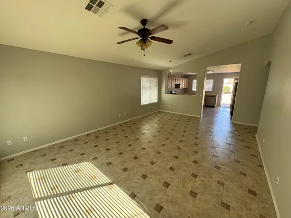 a view of a hallway with a window