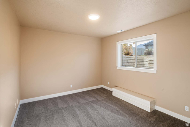 1997 West Cres Drive Mapleton, UT 84664 - Photo 25 of 35 Carpeted empty room featuring baseboards