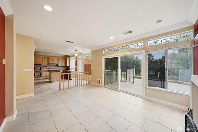 a kitchen with stainless steel appliances granite countertop a stove and a sink
