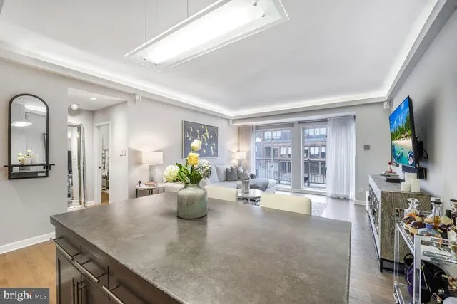 a view of a living room and dining room
