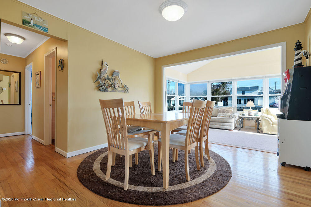 27 Cedar Run Road Bayville, NJ 08721 - Photo 15 of 64 Dining into Sunroom