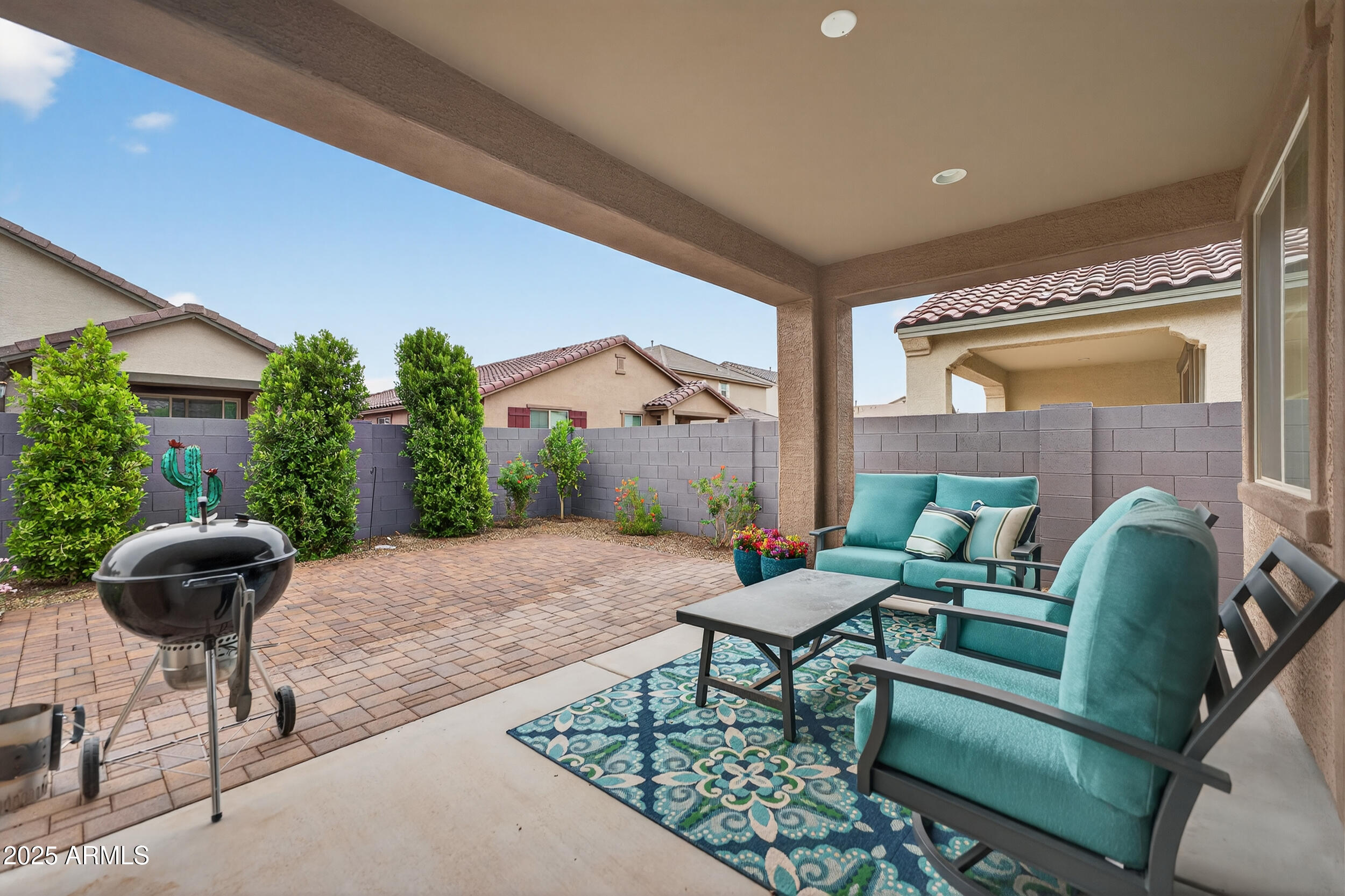 10218 West Piccadilly Road Avondale, AZ 85392 - Photo 24 of 28 a living room with furniture and a large window