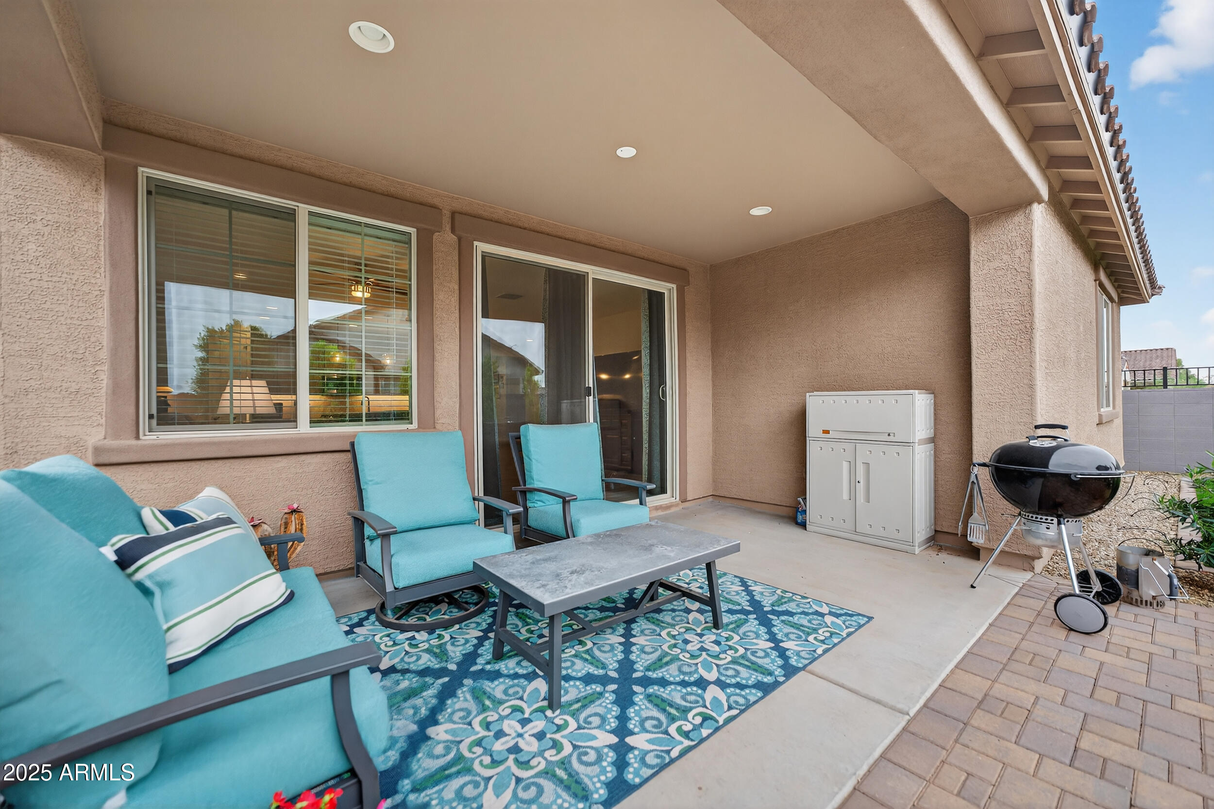 10218 West Piccadilly Road Avondale, AZ 85392 - Photo 25 of 28 a living room with furniture and a window