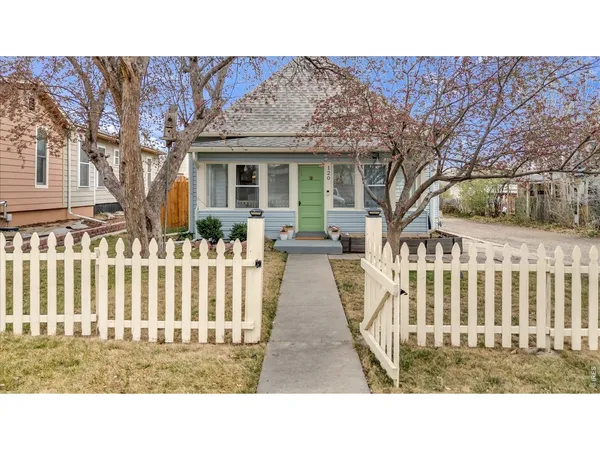 a black and white photo of a house