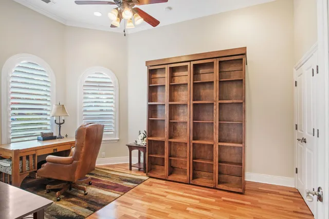 a view of a livingroom with furniture and windows