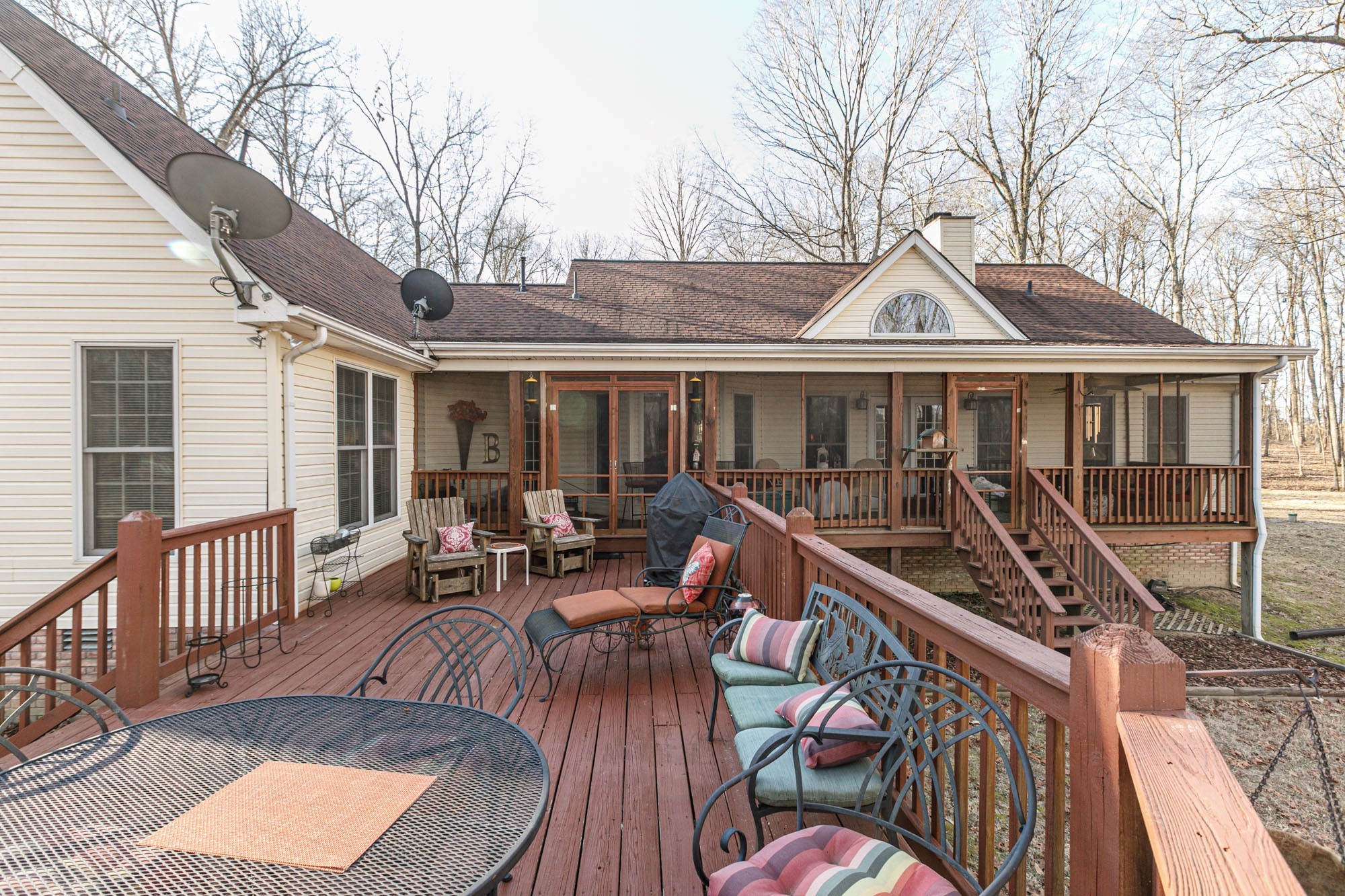 7126 Elrod Road Fairview, TN 37062 - Photo 11 of 36 a view of a house with wooden deck outdoor seating