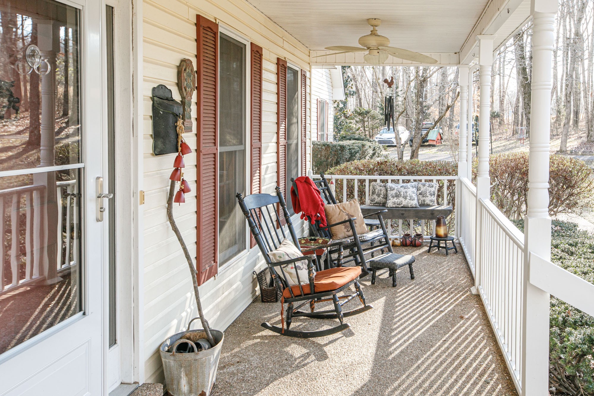 7126 Elrod Road Fairview, TN 37062 - Photo 14 of 36 a view of a chairs and table in deck with wooden floor