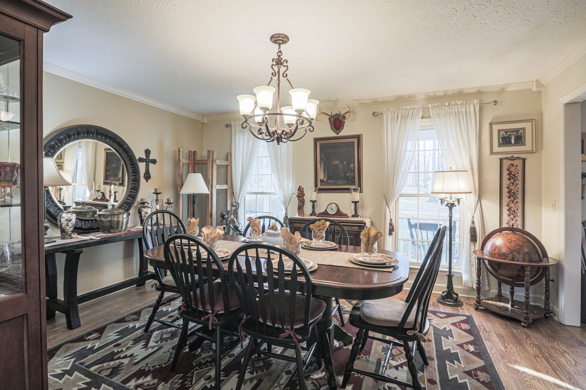 7126 Elrod Road Fairview, TN 37062 - Photo 27 of 36 a view of a dining room with furniture and a chandelier