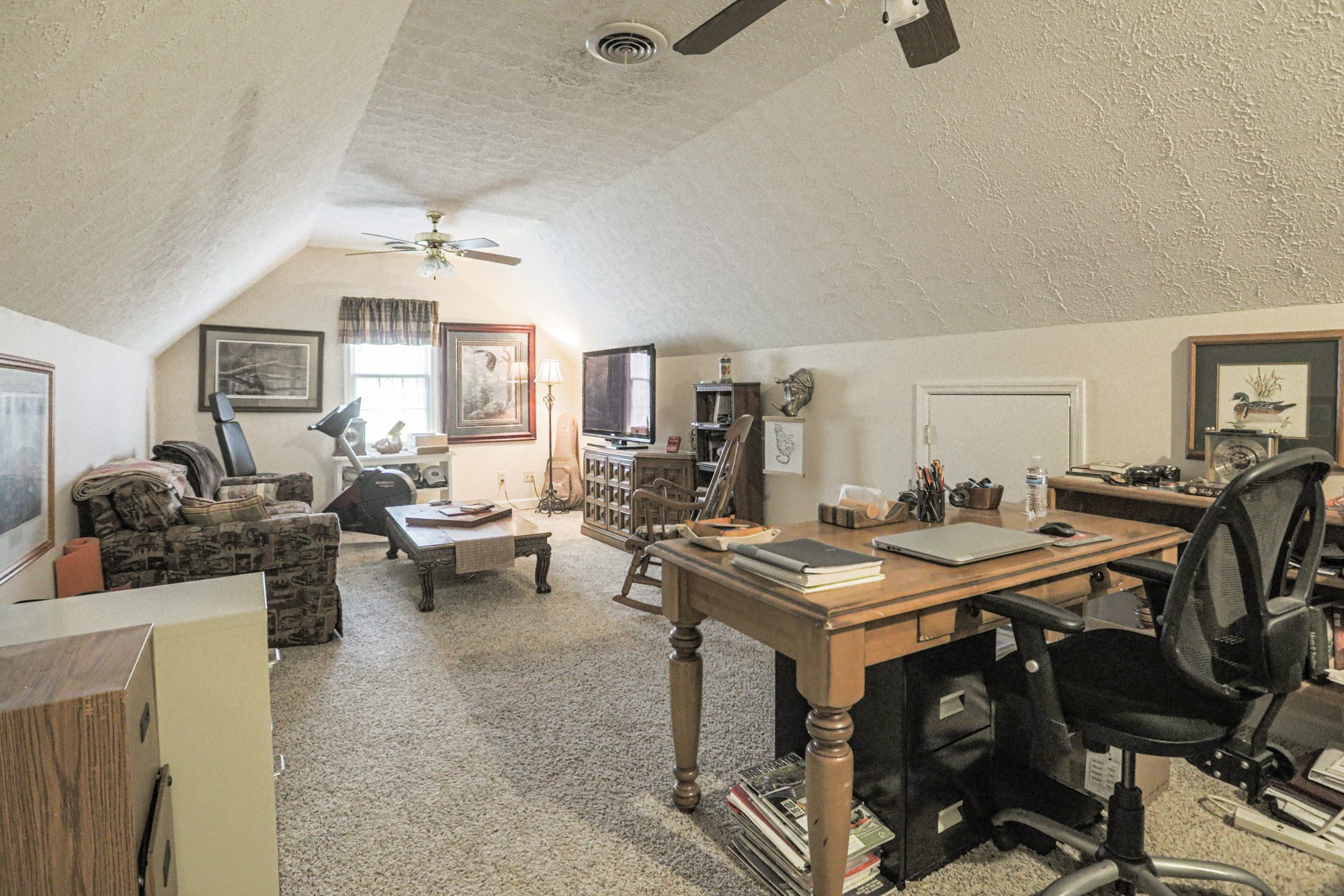 7126 Elrod Road Fairview, TN 37062 - Photo 33 of 36 a view of a workspace with furniture and a counter top space