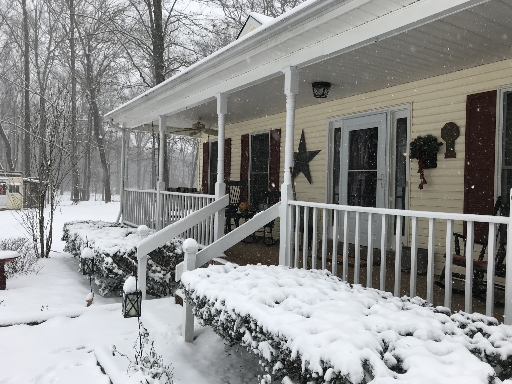 7126 Elrod Road Fairview, TN 37062 - Photo 35 of 36 a view of a patio with a table and chairs