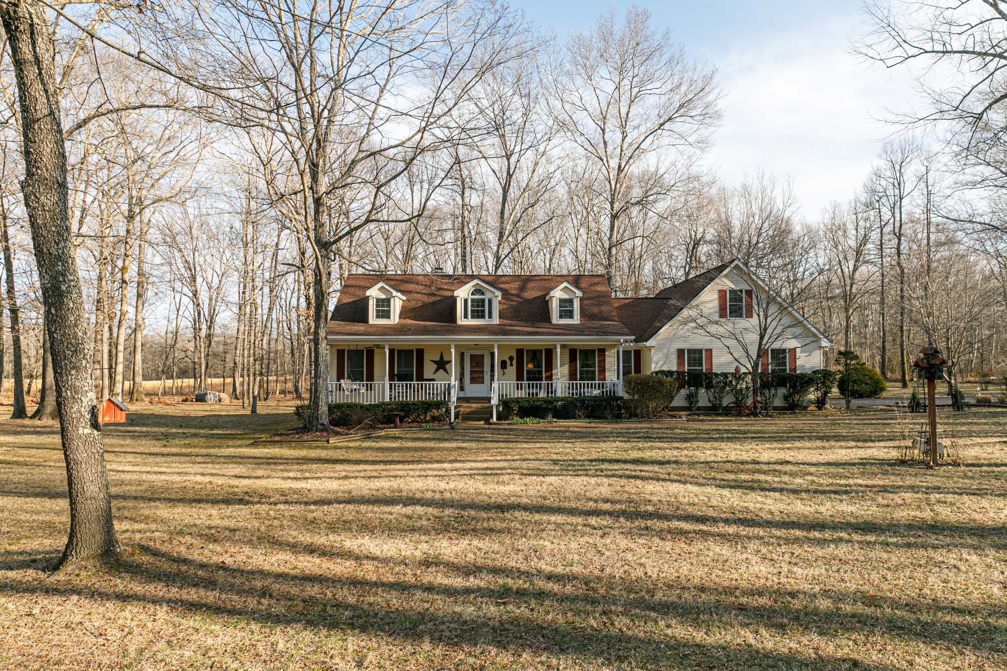 7126 Elrod Road Fairview, TN 37062 - Photo 4 of 36 a front view of a house with a garden