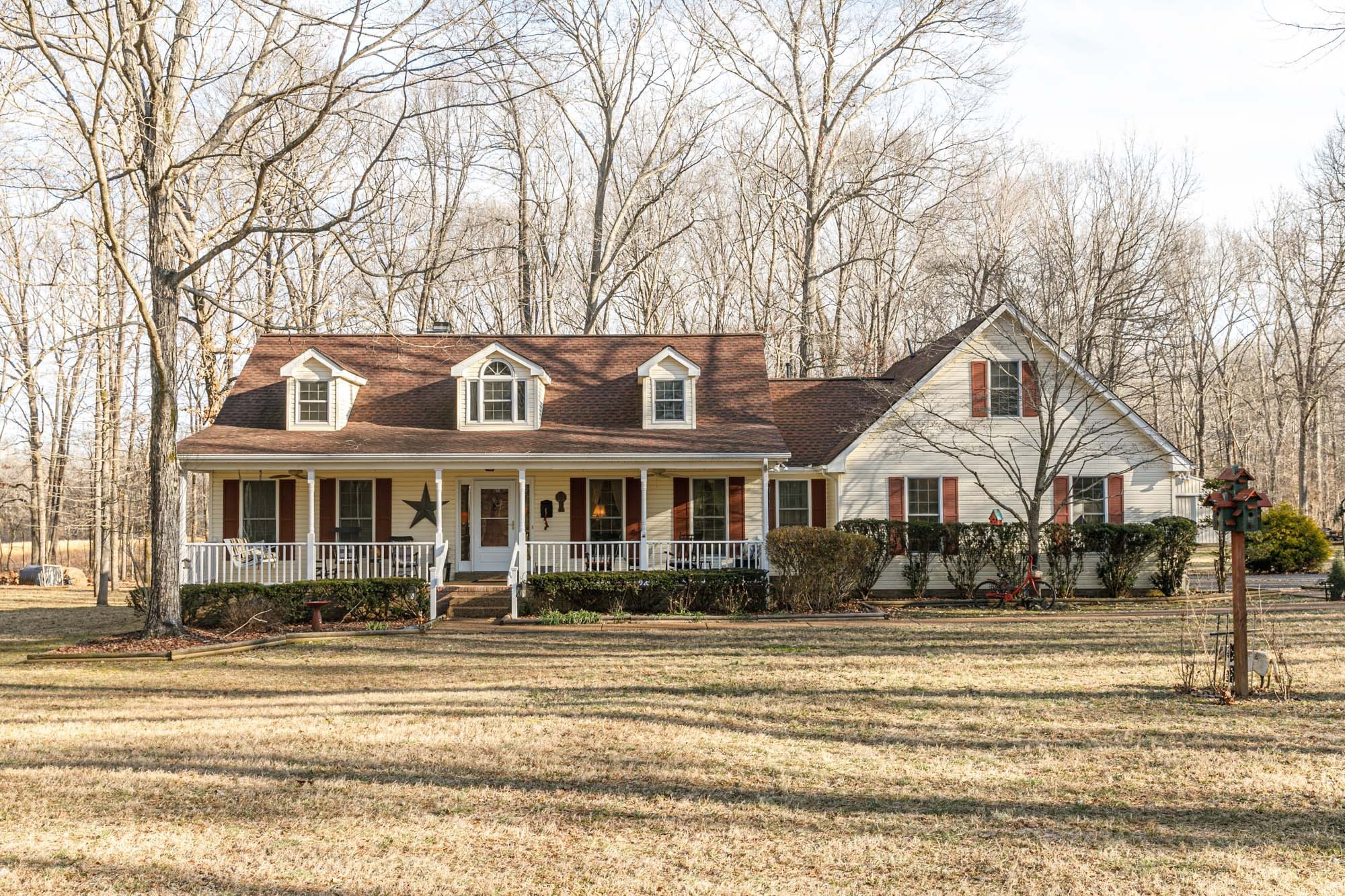 7126 Elrod Road Fairview, TN 37062 - Photo 6 of 36 a front view of a house with a garden