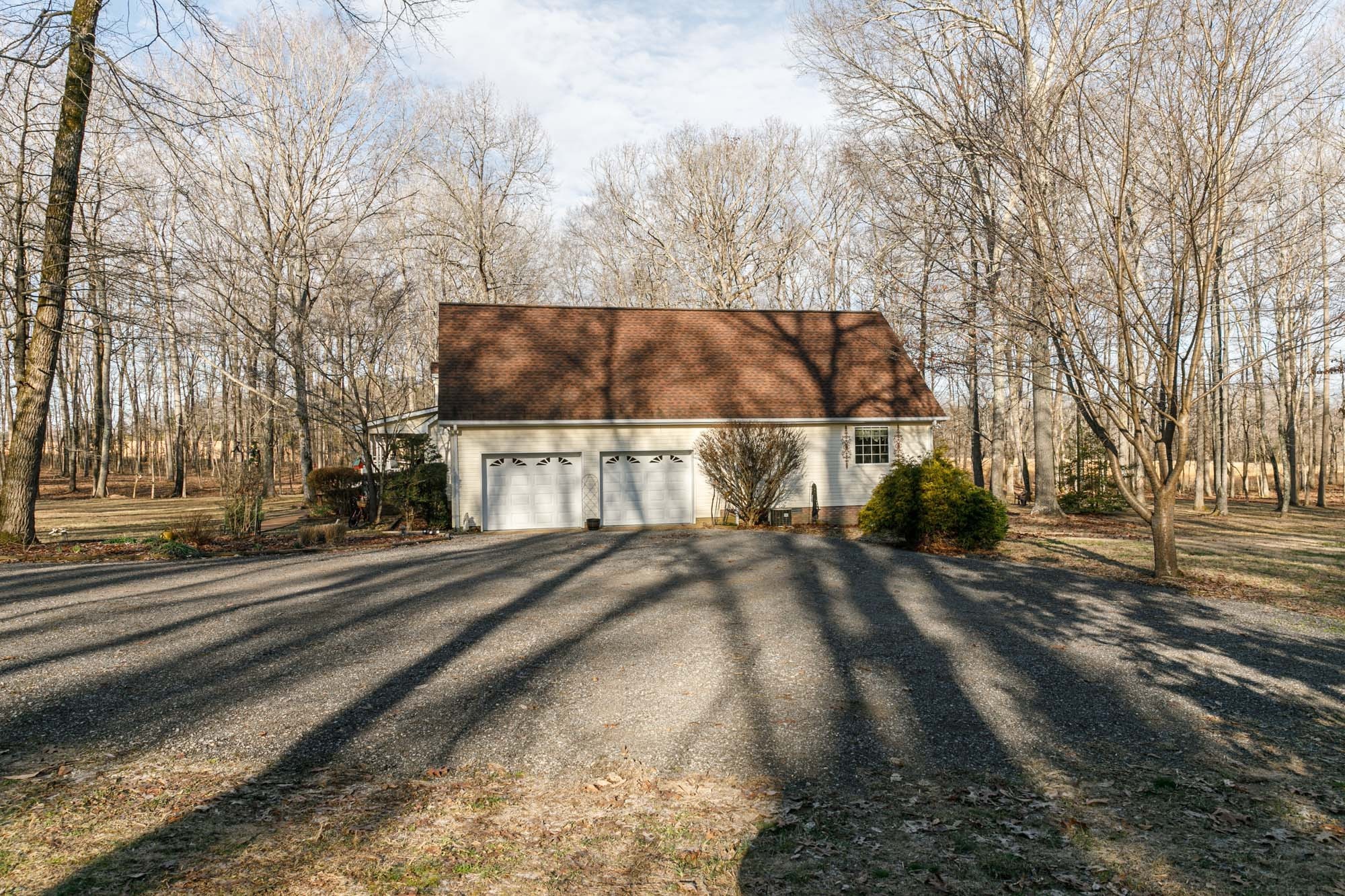 7126 Elrod Road Fairview, TN 37062 - Photo 7 of 36 a view of a houses with snow on the road