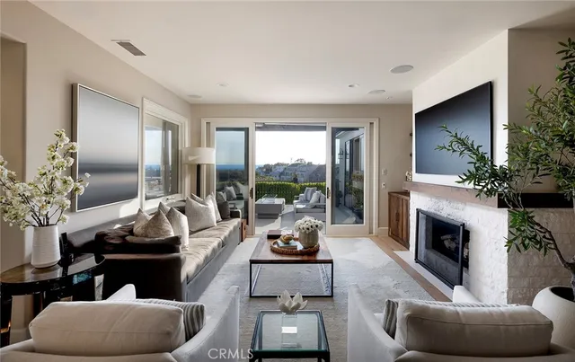 a kitchen with a table chairs sink and cabinets