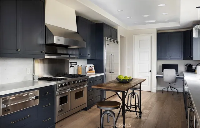 a view of a roof deck with furniture