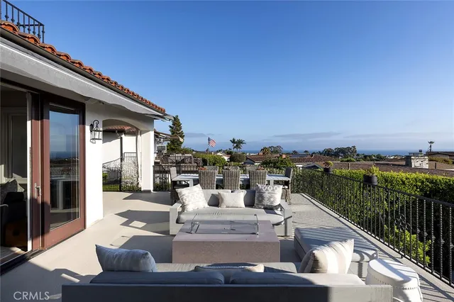 a bathroom with a double vanity sink a mirror and a bathtub