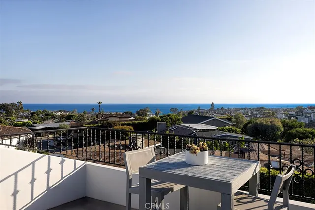 a kitchen with a sink a stove and cabinets