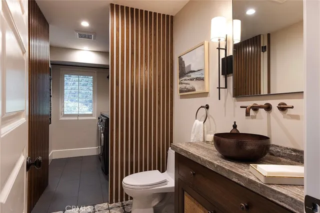 a view of a backyard with sitting area