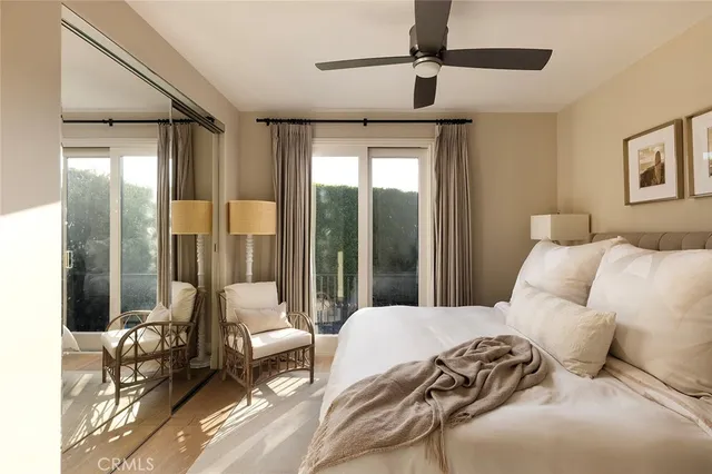 a view of a backyard with plants and patio