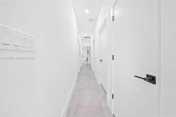 a bathroom with a sink toilet a mirror and shower