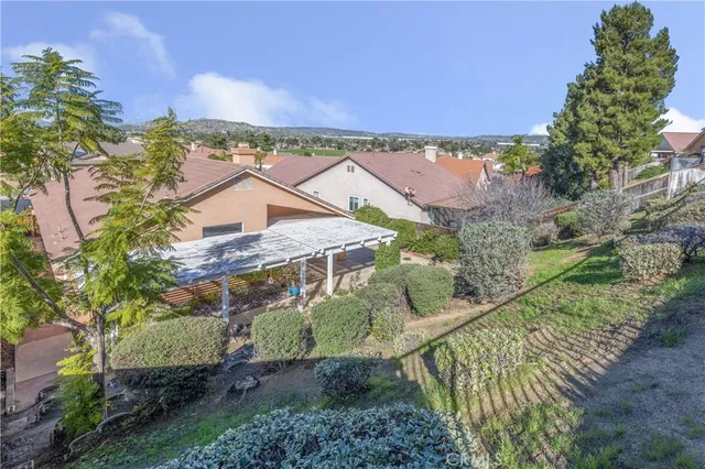 a view of a house with a street