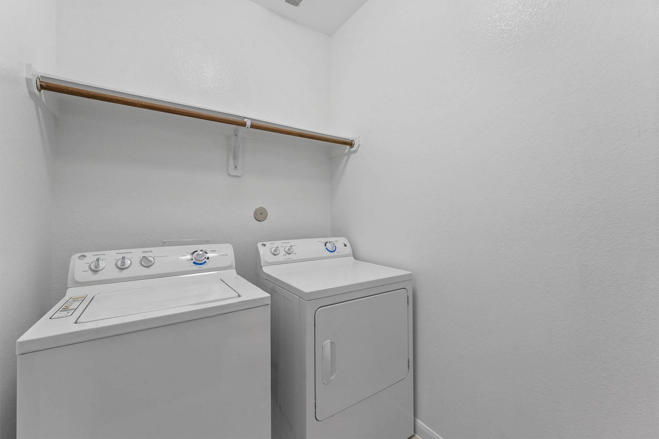 3841 Enchanted Timbers Lane Spring, TX 77386 - Photo 17 of 28 a utility room with dryer and washer