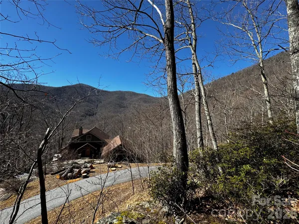 a view of a backyard of the house
