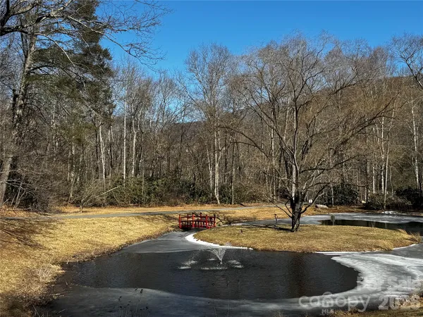 a view of a backyard of the house