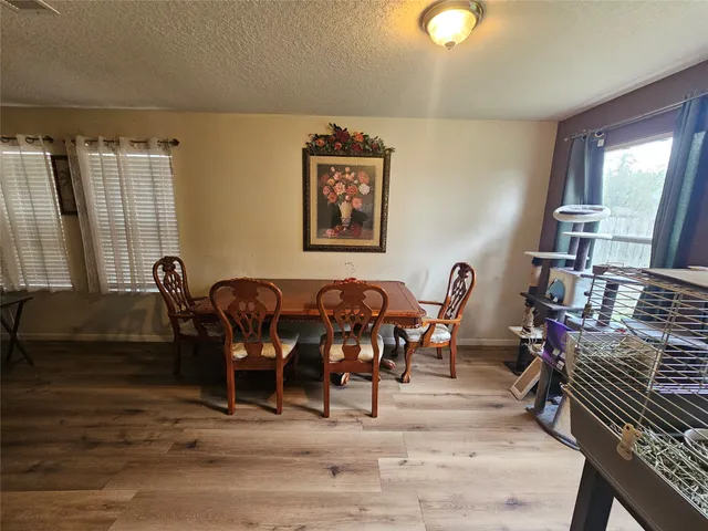 a view of a dining room with furniture