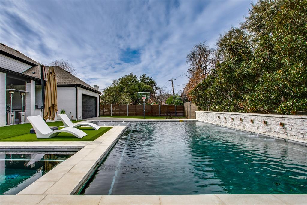 7141 Northaven Road Dallas, TX 75230 - Photo 2 of 38 a view of swimming pool with lawn chairs and plants