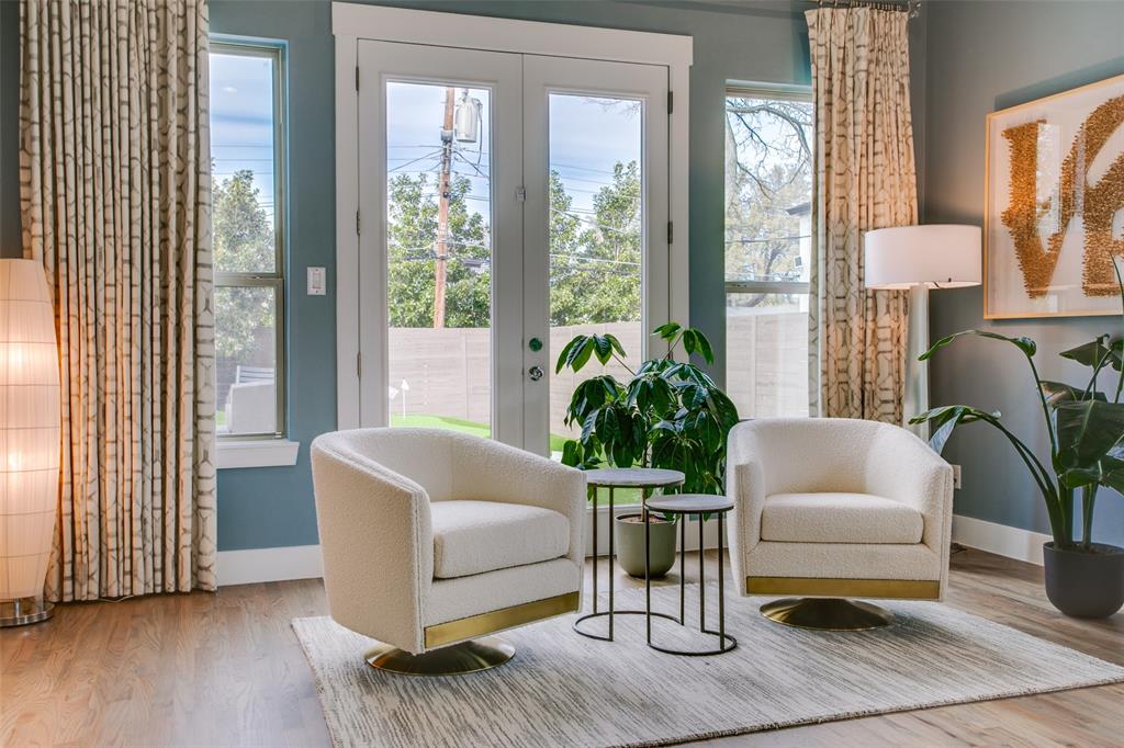 7141 Northaven Road Dallas, TX 75230 - Photo 22 of 38 a living room with furniture and a potted plant