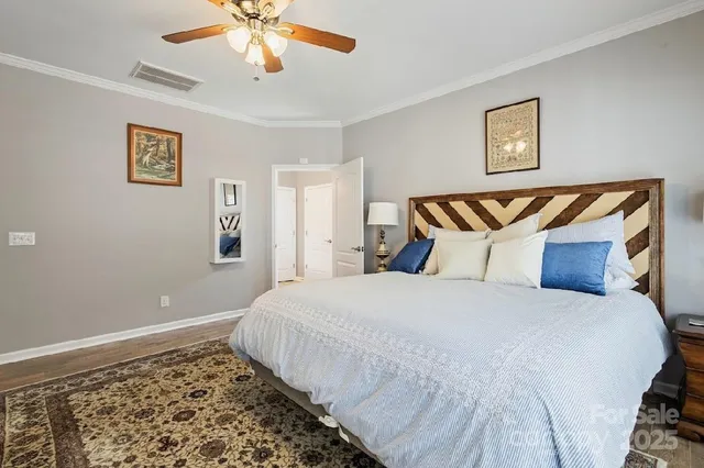 a bedroom with bed and window