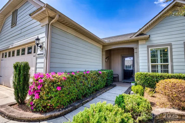 a house with a flower garden