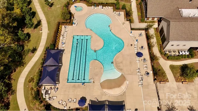 an aerial view of a house with outdoor space