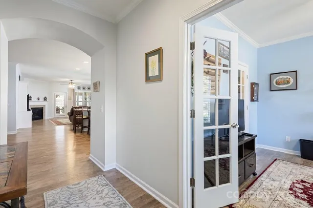 a view of a living room and hardwood floor