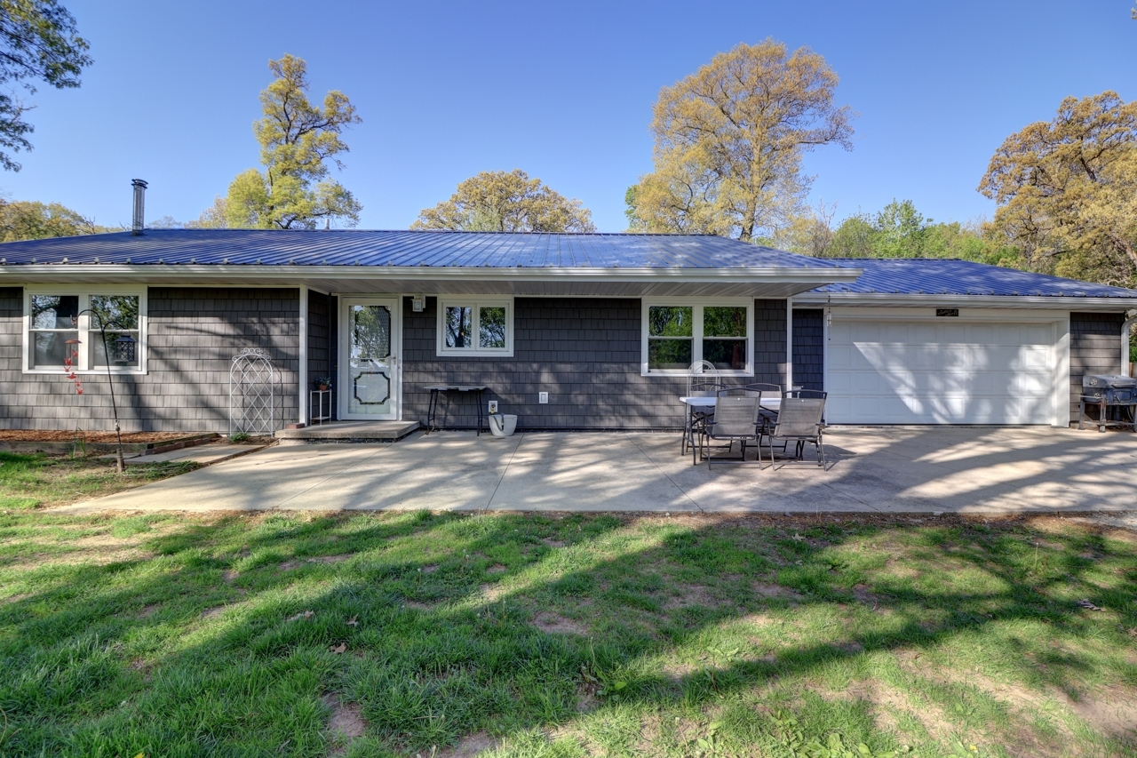 14755 Fenton Road Morrison, IL 61270 - Photo 2 of 34 a view of a house with backyard and sitting area