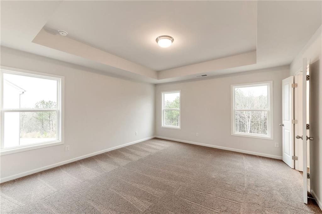 106 Windmill Court Calhoun, GA 30701 - Photo 15 of 29 a view of an empty room with a window