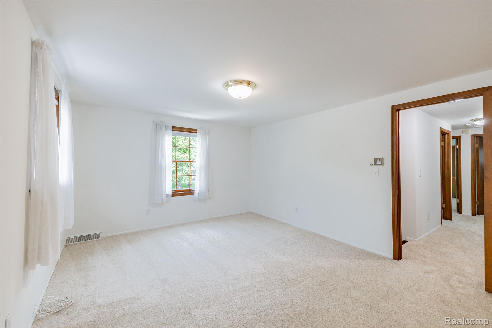 7611 Ferry Road Grosse Ile, MI 48138 - Photo 32 of 51 Neutral-toned carpeting throughout