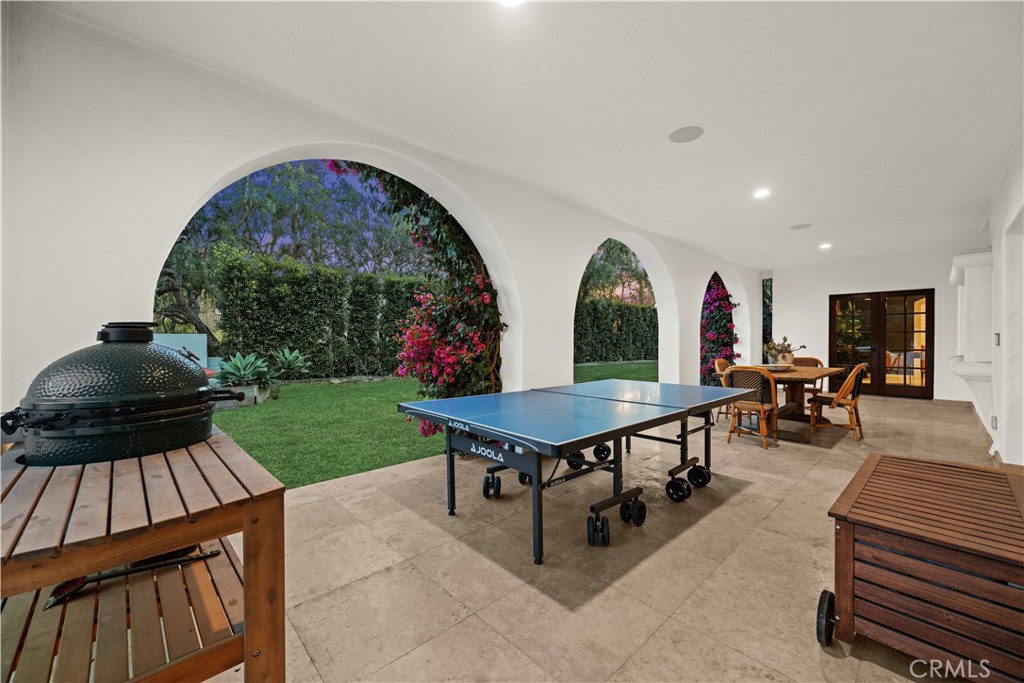 2347 East Valley Road Montecito, CA 93108 - Photo 13 of 43 a living room with furniture a garden and a table