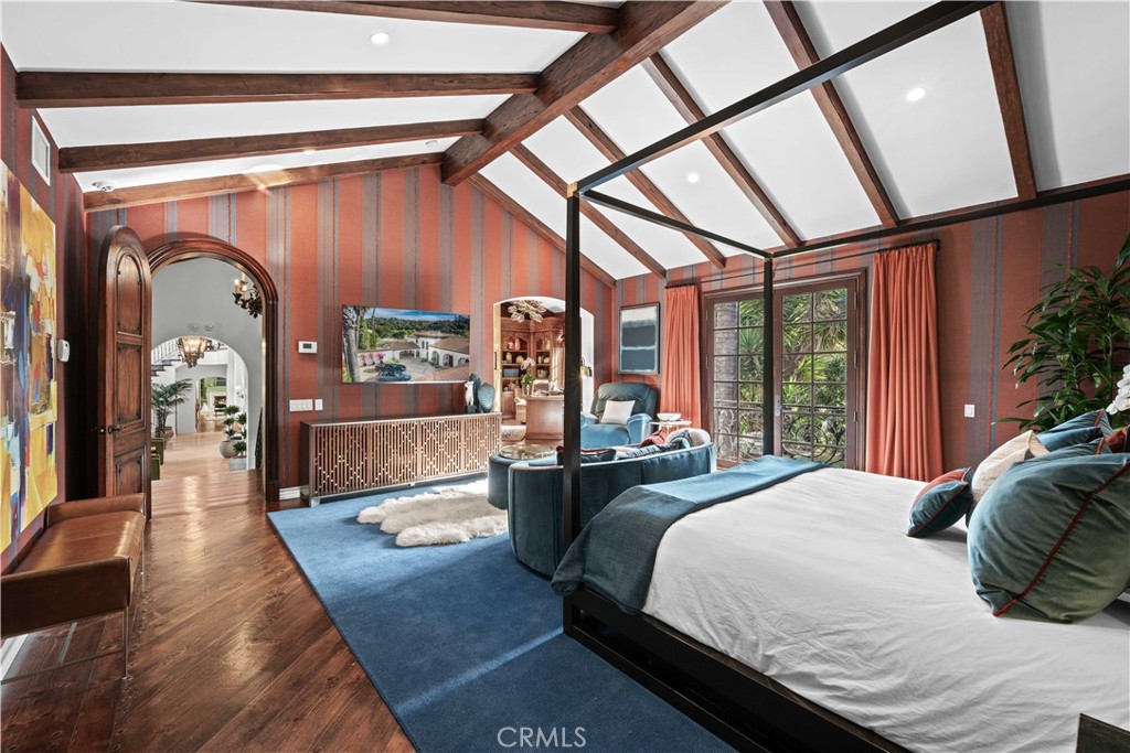 2347 East Valley Road Montecito, CA 93108 - Photo 17 of 43 a bedroom with a large bed and a large window