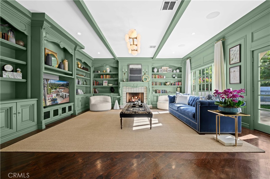 2347 East Valley Road Montecito, CA 93108 - Photo 25 of 43 a living room with furniture fireplace and flat screen tv