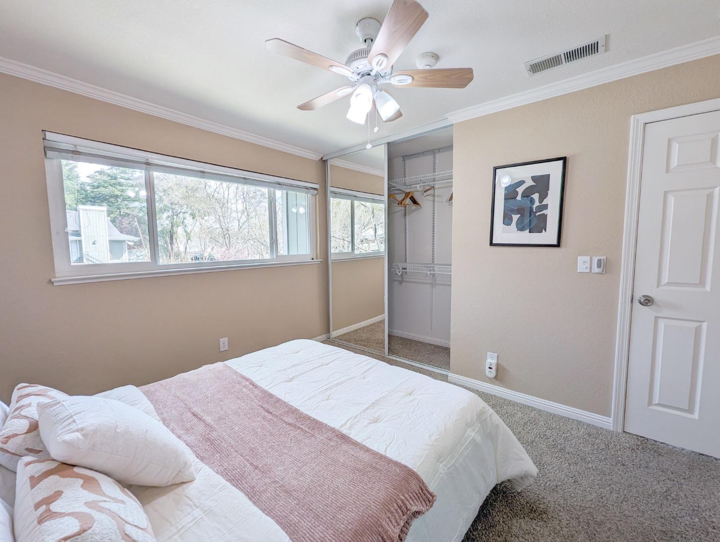 205 Compton Circle, Unit B San Ramon, CA 94583 - Photo 14 of 24 a bedroom with a large bed and a window