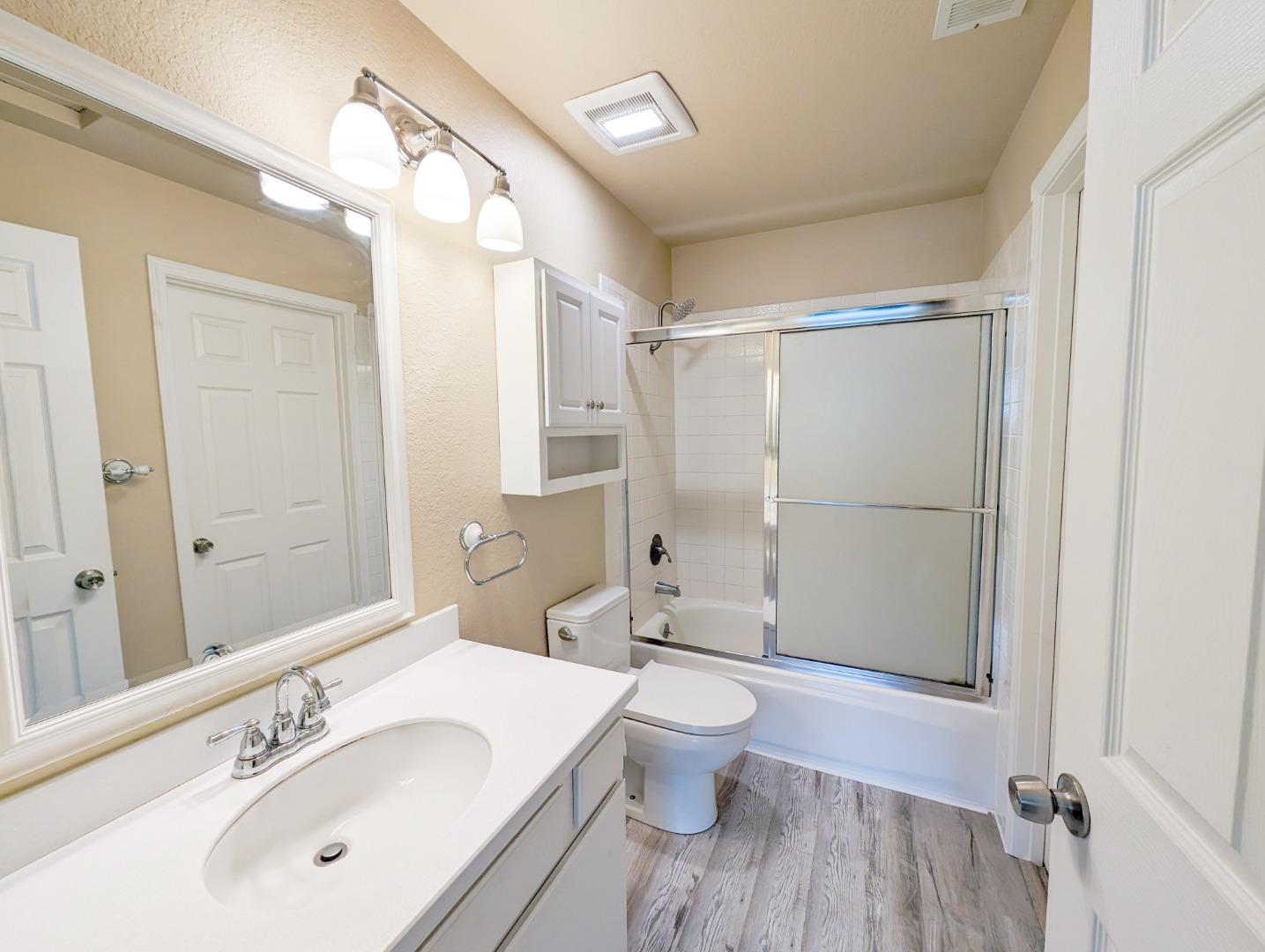 205 Compton Circle, Unit B San Ramon, CA 94583 - Photo 15 of 24 a bathroom with a sink toilet and shower