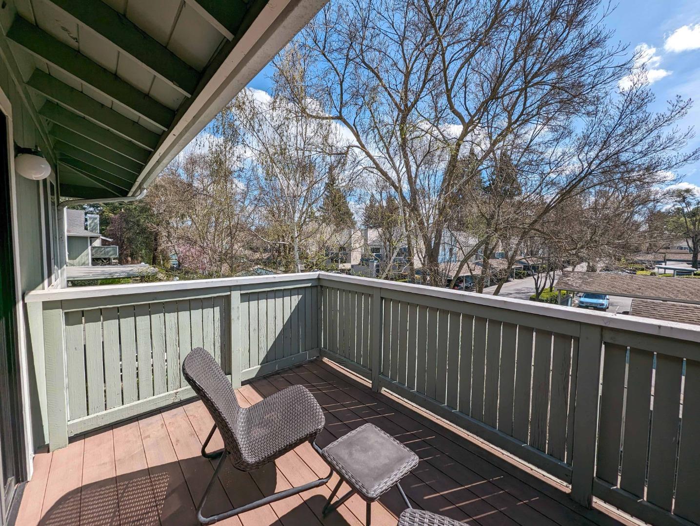 205 Compton Circle, Unit B San Ramon, CA 94583 - Photo 19 of 24 a view of a chair and table in the balcony