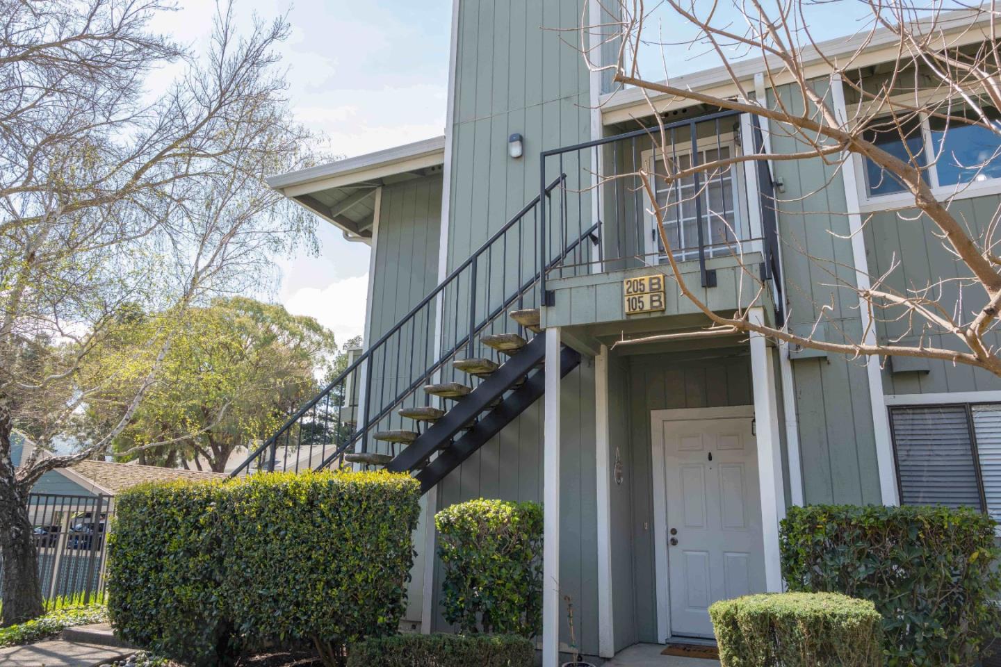 205 Compton Circle, Unit B San Ramon, CA 94583 - Photo 21 of 24 a view of a house with a tree in front of it