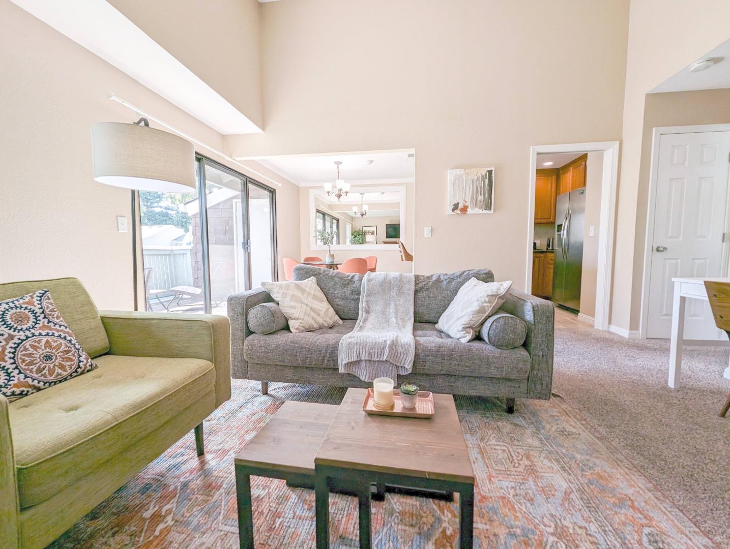 205 Compton Circle, Unit B San Ramon, CA 94583 - Photo 3 of 24 a living room with furniture and a large window