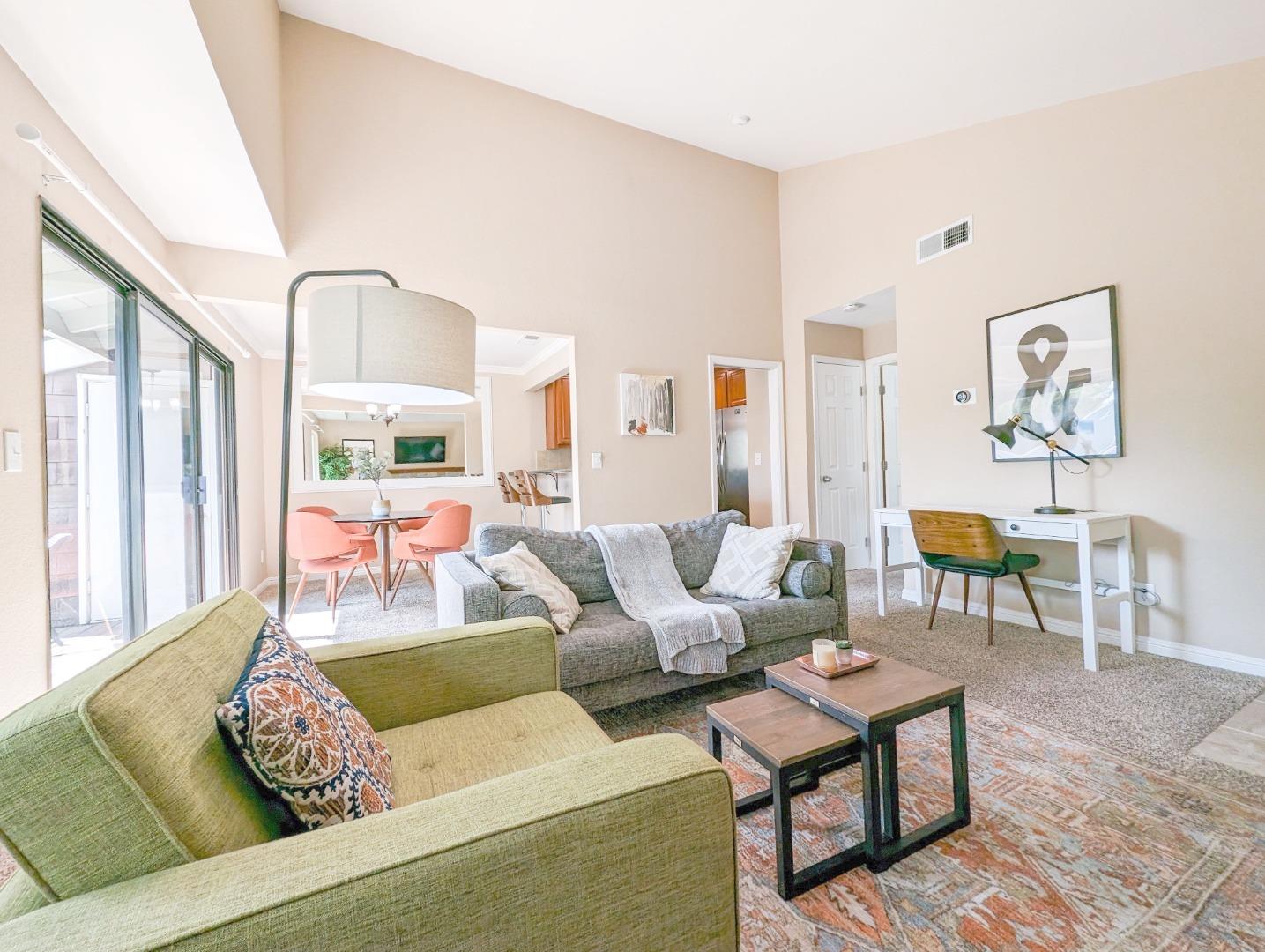 205 Compton Circle, Unit B San Ramon, CA 94583 - Photo 4 of 24 a living room with furniture and a large window