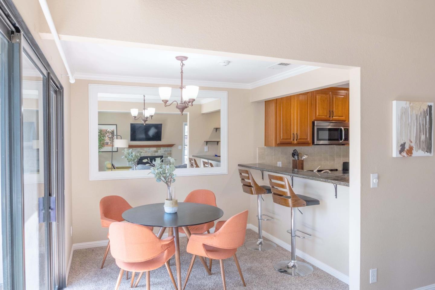 205 Compton Circle, Unit B San Ramon, CA 94583 - Photo 6 of 24 a view of a dining room with furniture and wooden floor